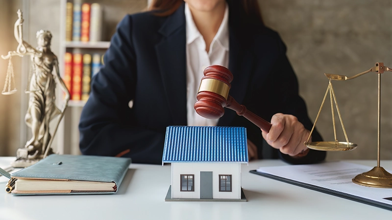 Business lawyers working with agreement contract in office.
