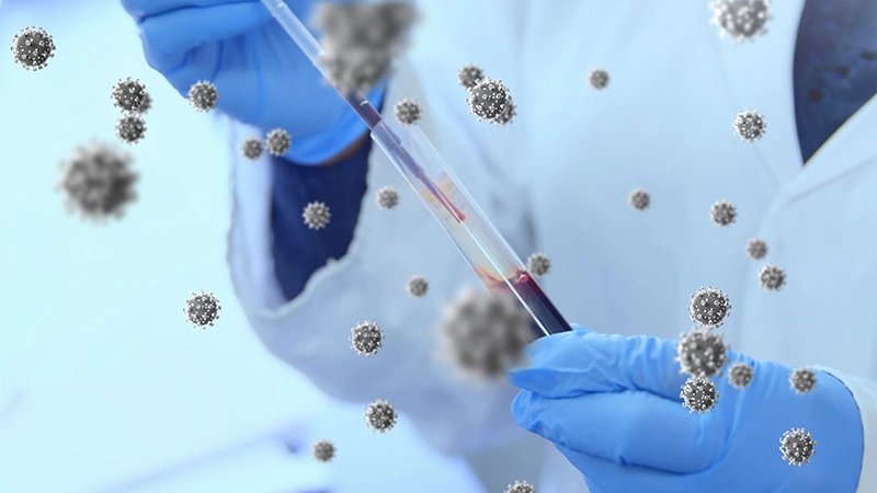 Image of floating macro Covid-19 cells over doctor taking sample and wearing medical gloves in lab.
